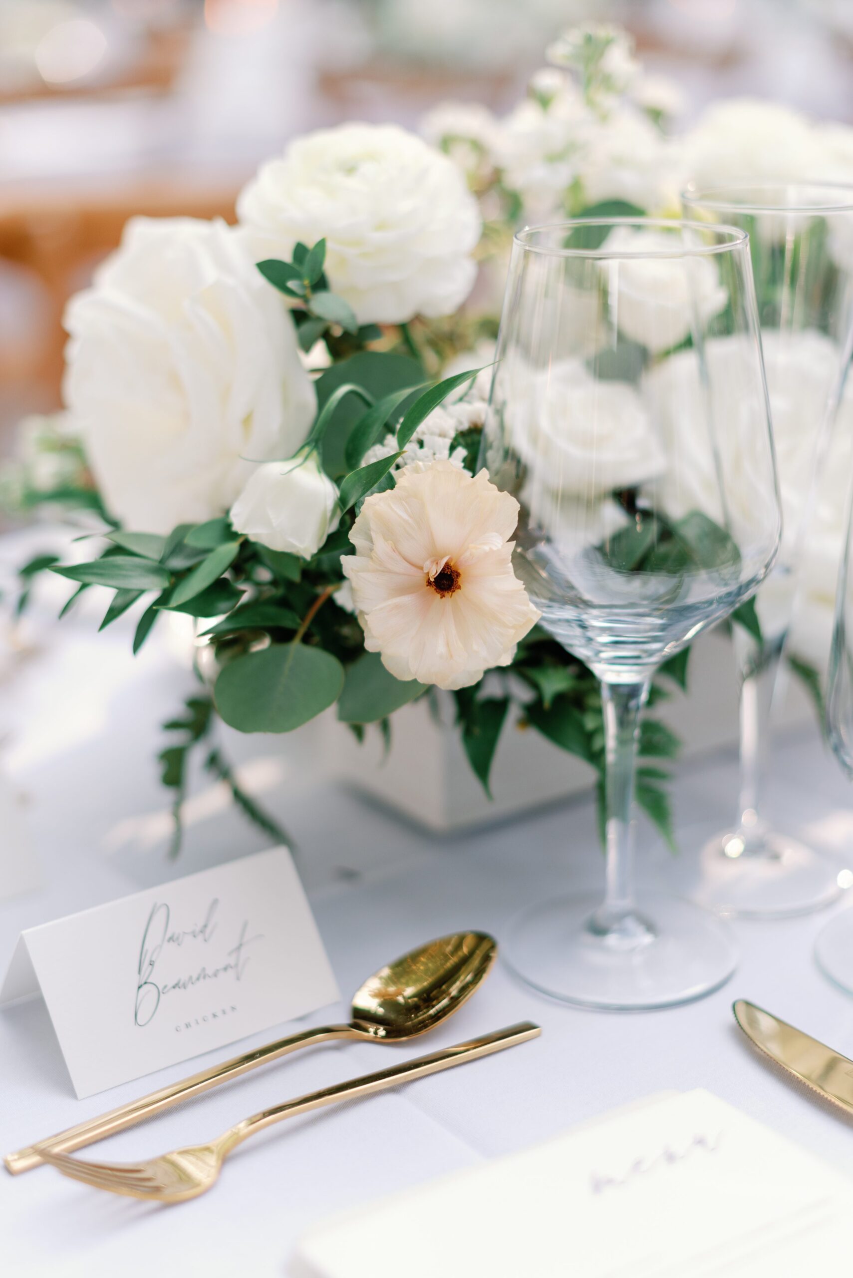 White and gold wedding details.