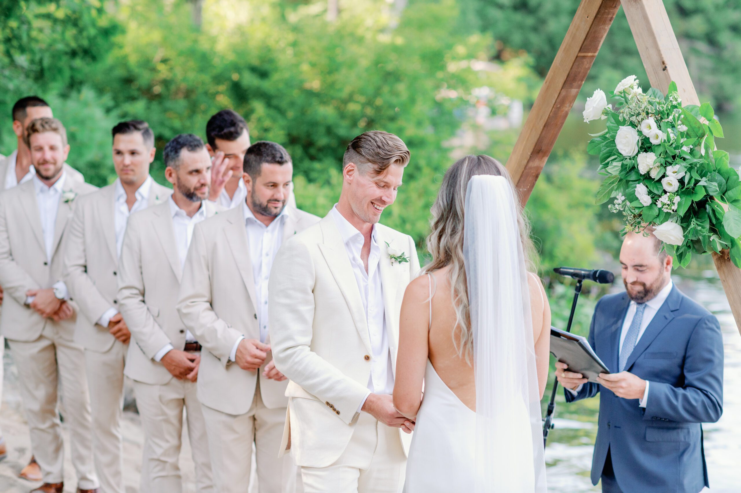 Emotional moment of groom during wedding ceremony.